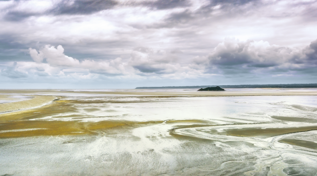 Low tide. Normandy, France. Photo by: StevanZZ for Envato